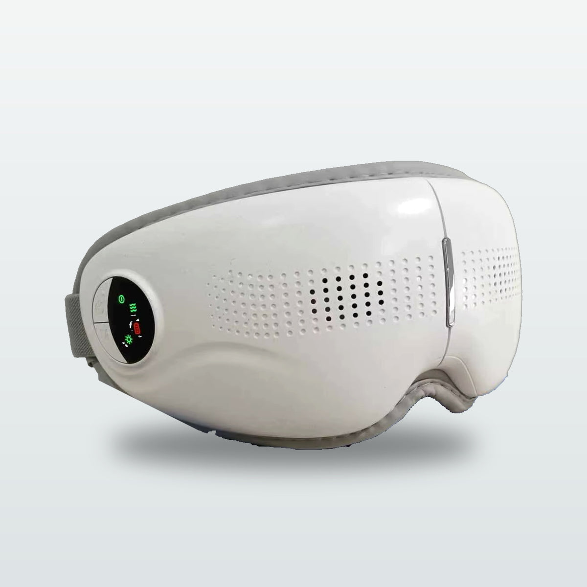 Nexora rechargeable eye massager with control buttons and speaker grille